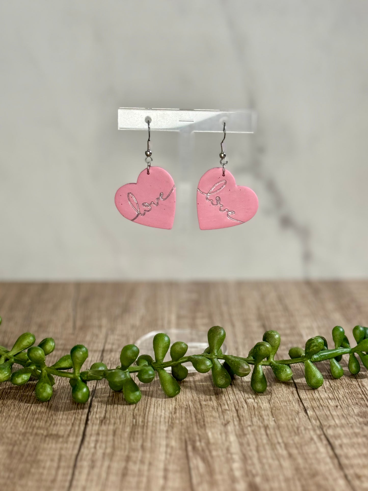 Love heart dangle earrings
