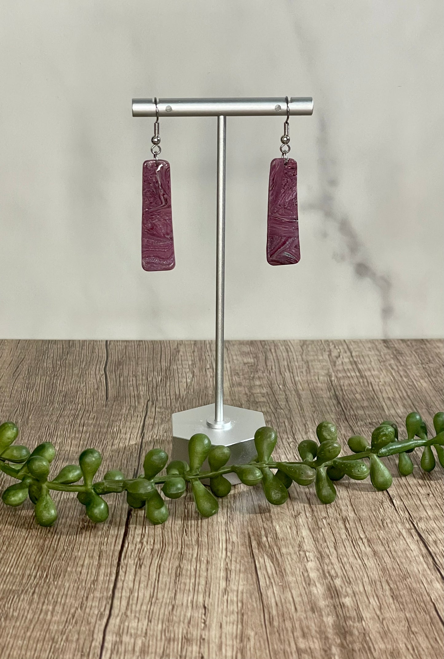 Swirled mauve earrings