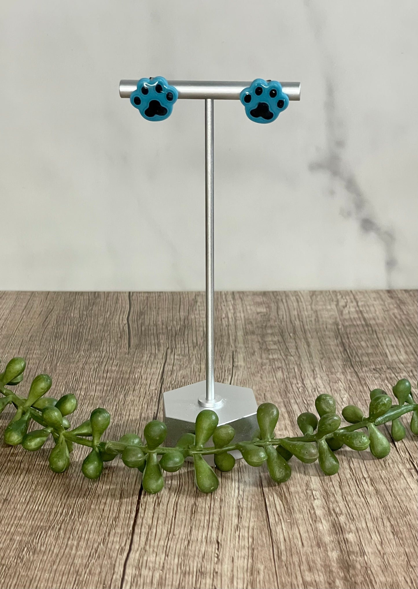Assorted paw print stud earrings