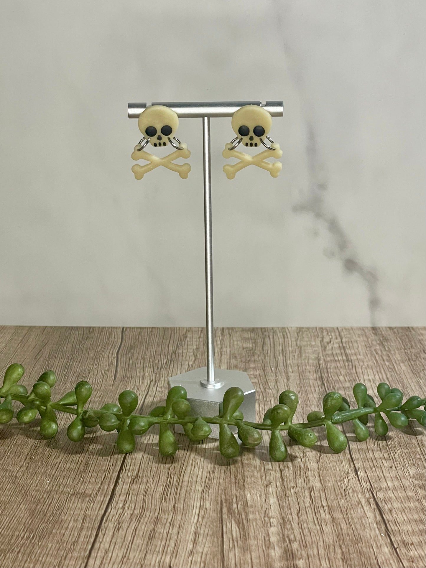 Skull and crossbones stud earrings