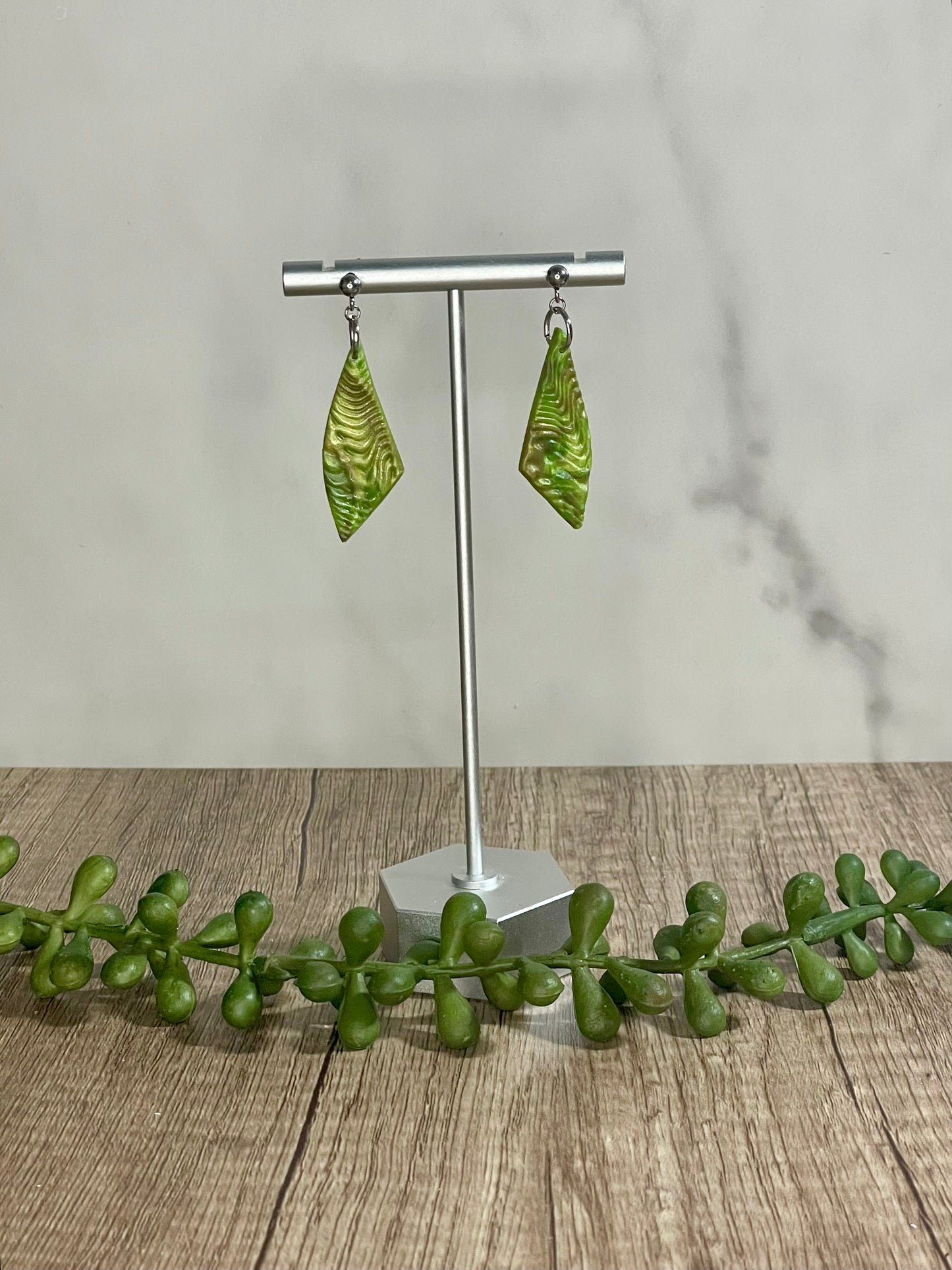 Textured green marbled earrings