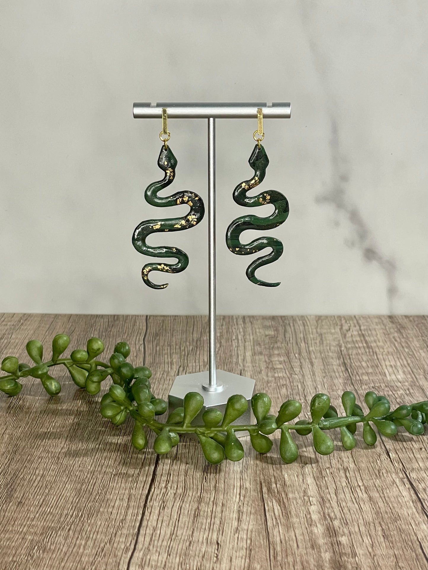 Marbled green and gold snake earrings