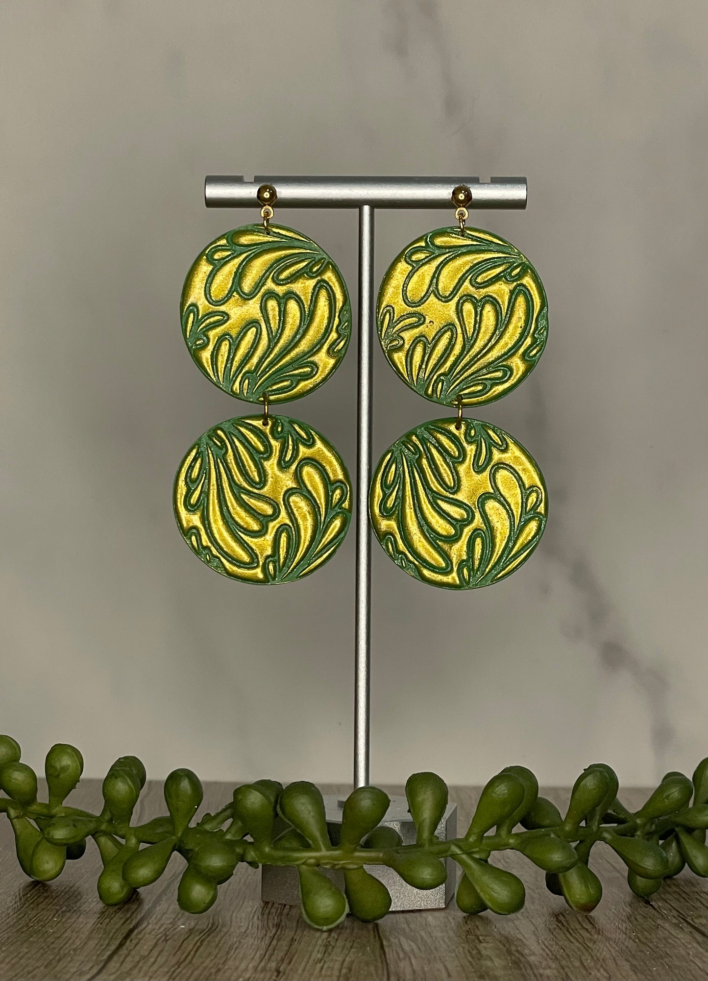 Double circle green and gold embossed stud dangle earrings