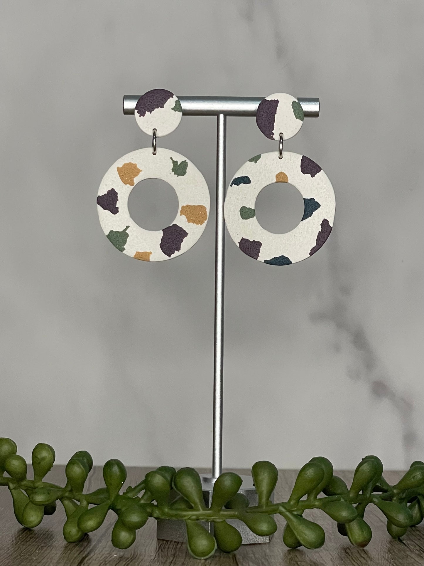 Neutral spotted ring earrings