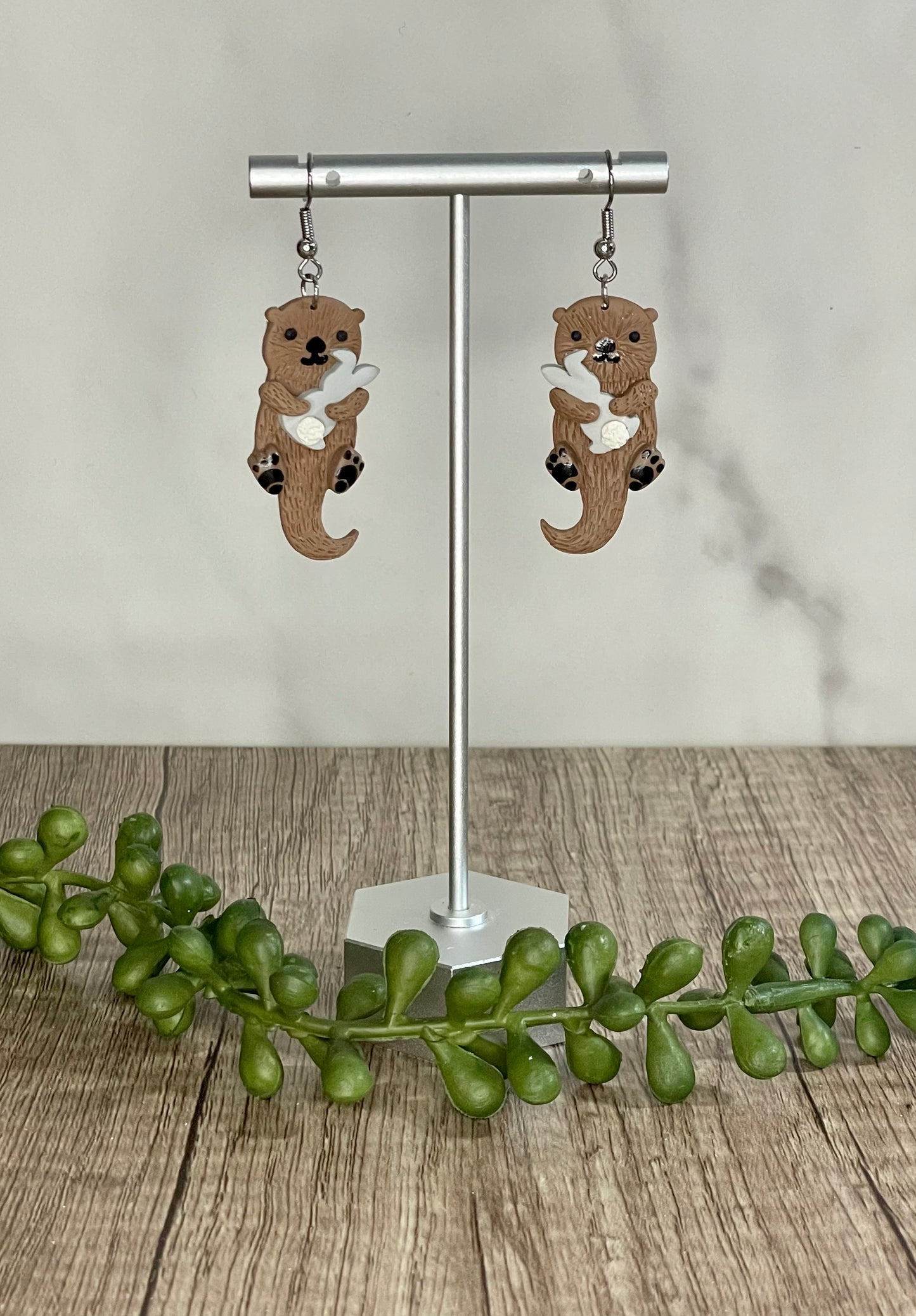 Easter otter earrings