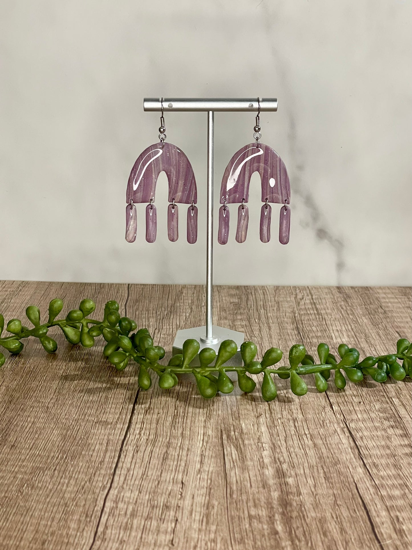 Purple striped arch dangle earrings