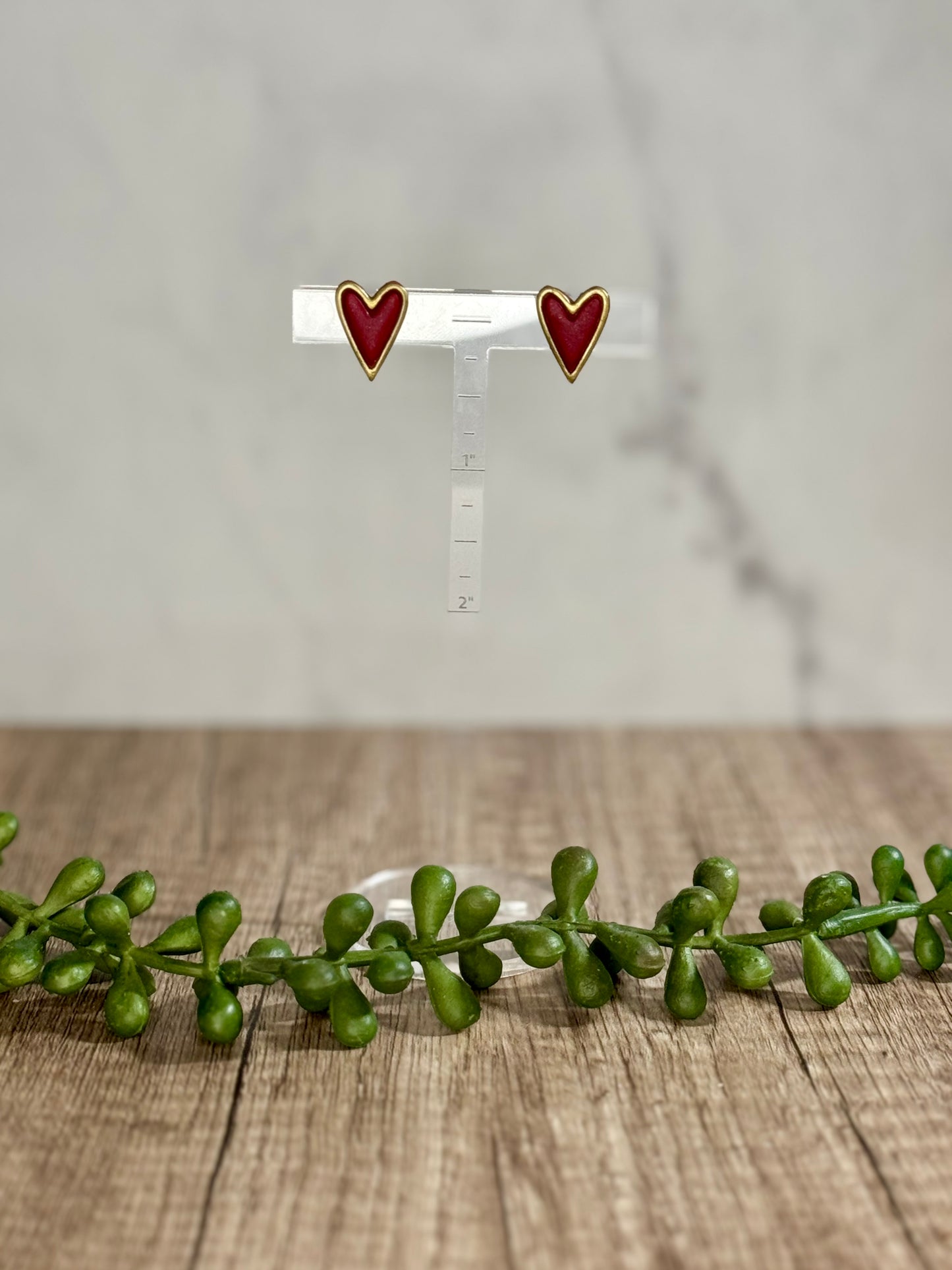 Framed heart stud earrings