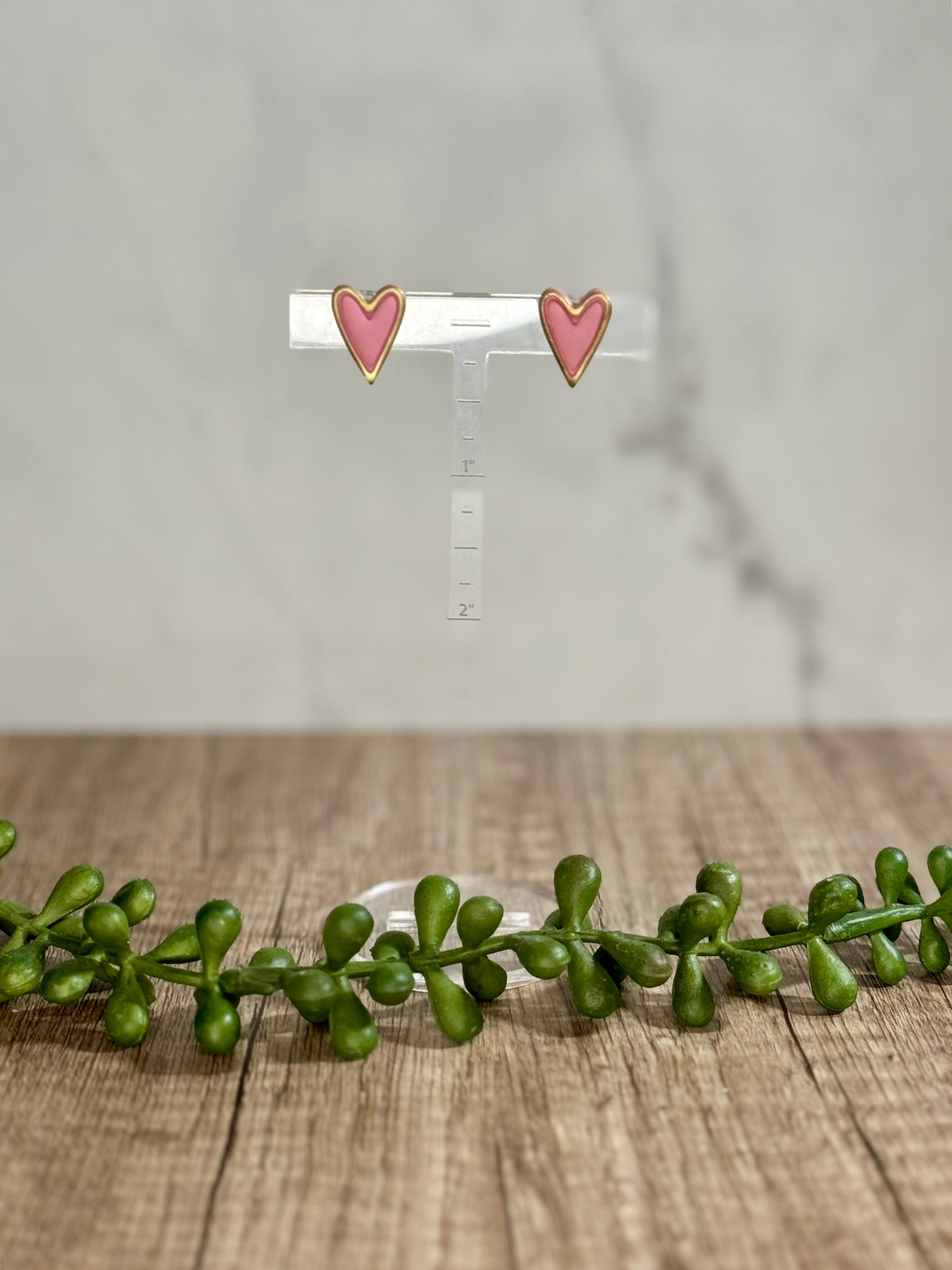 Framed heart stud earrings