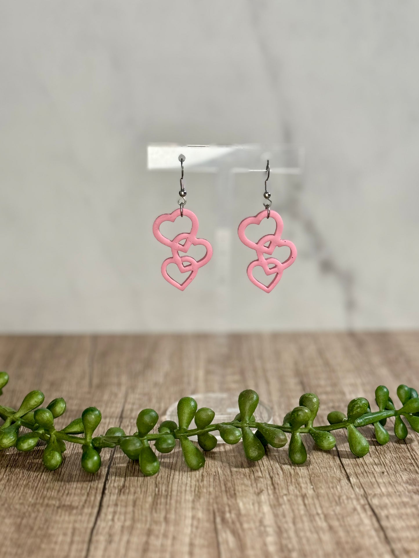 Pink stacked heart outline dangle earrings