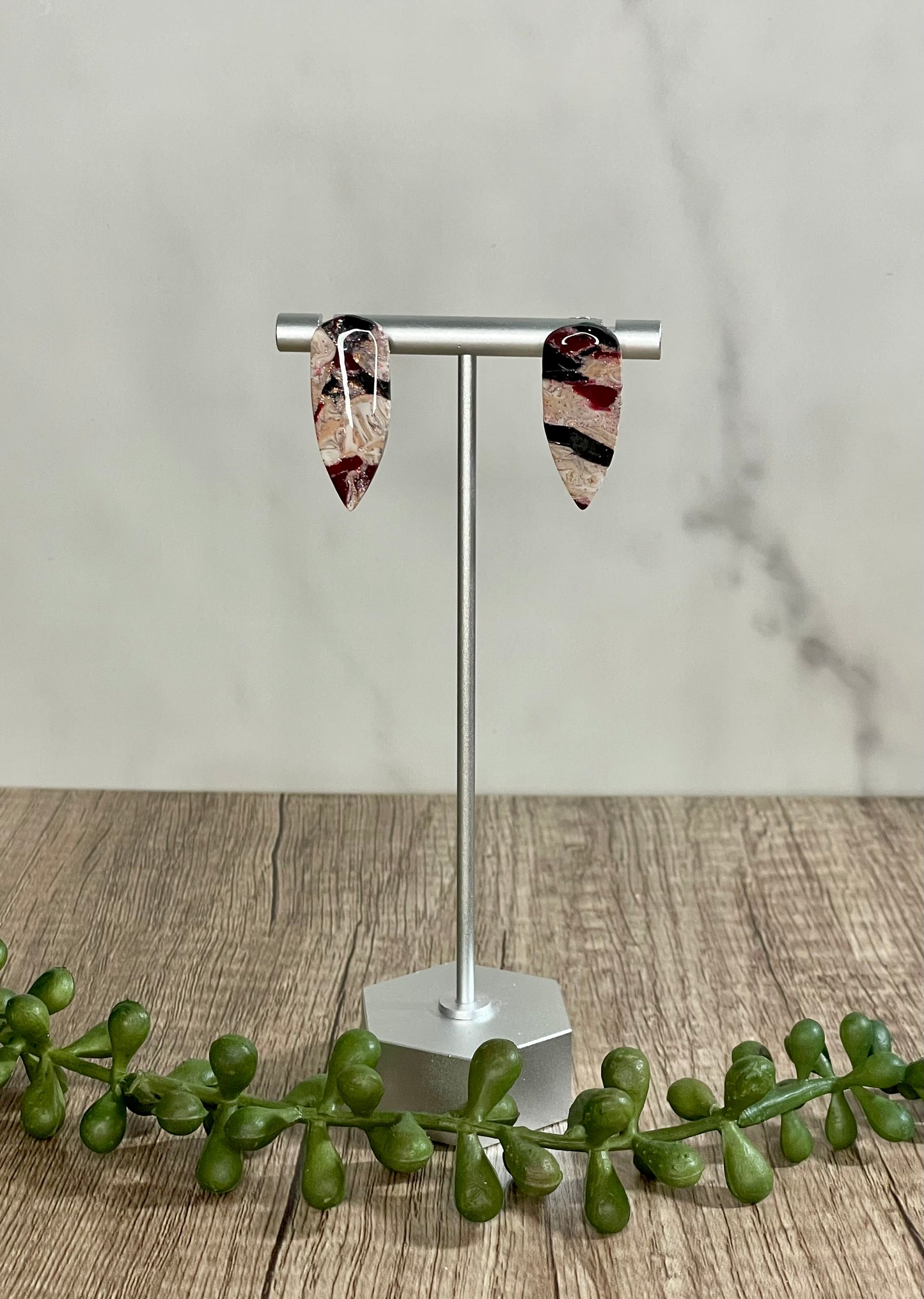 Peach, maroon, and black marbled earrings