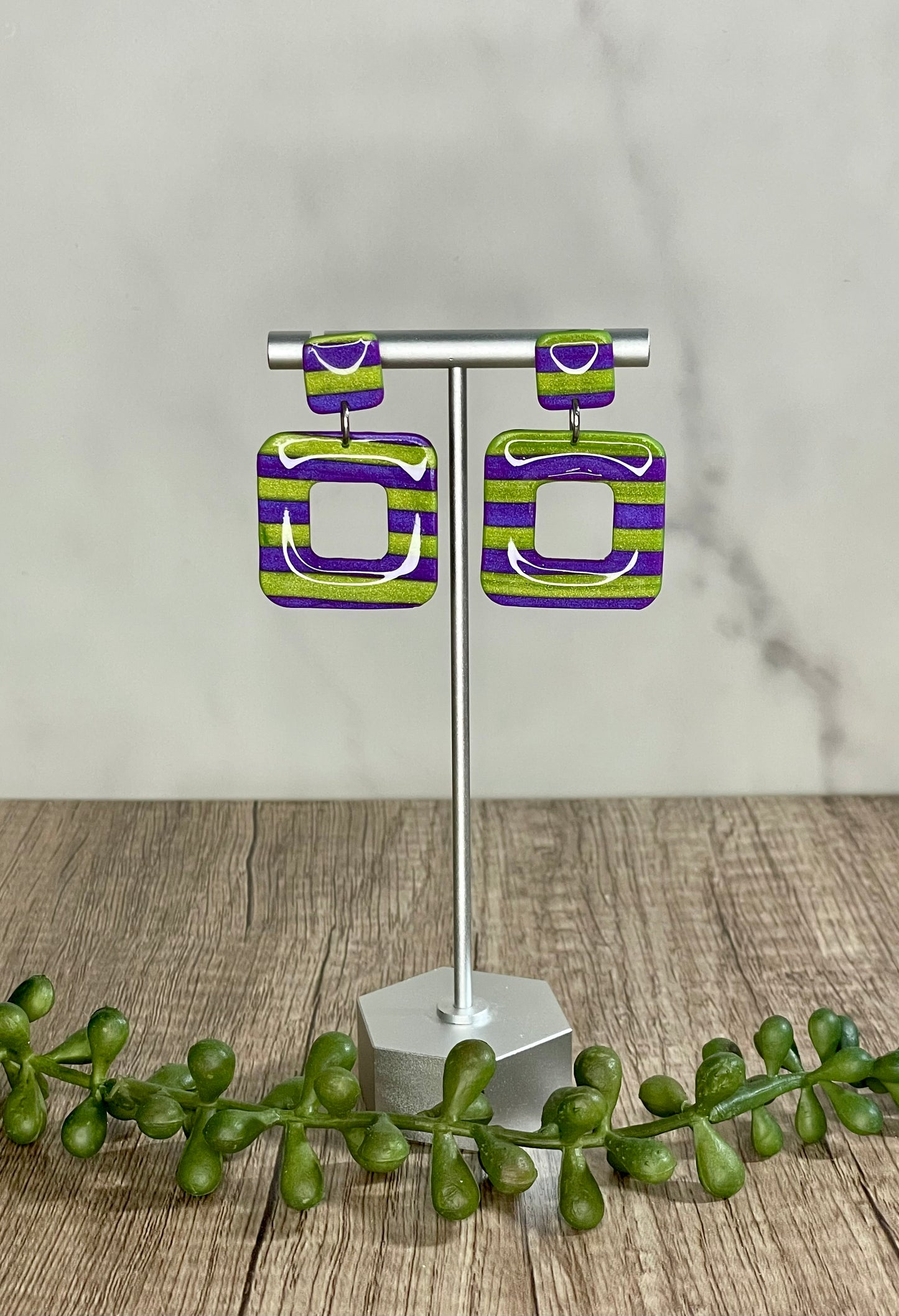 Purple and green striped earrings