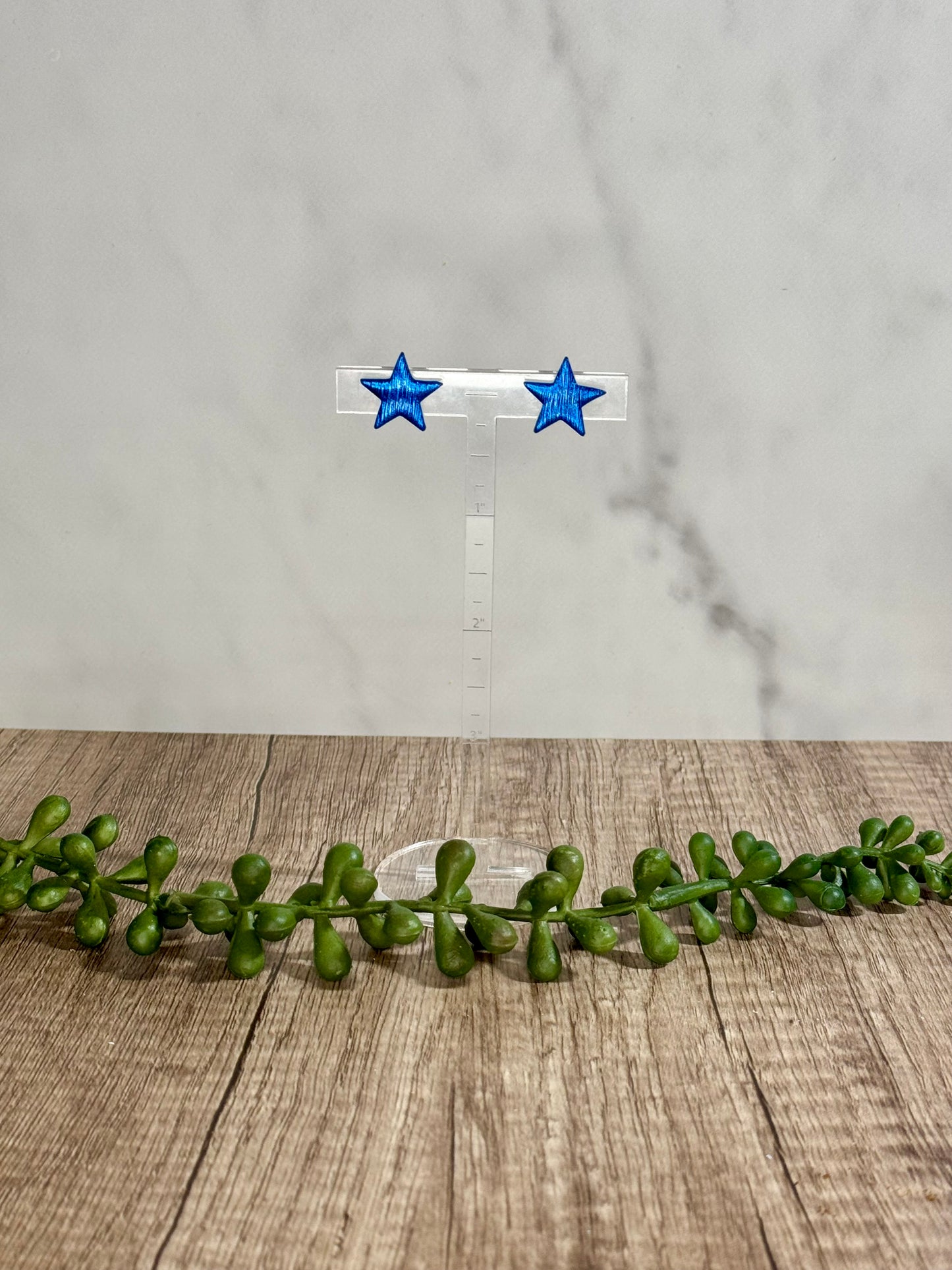 Assorted shimmering star stud earrings