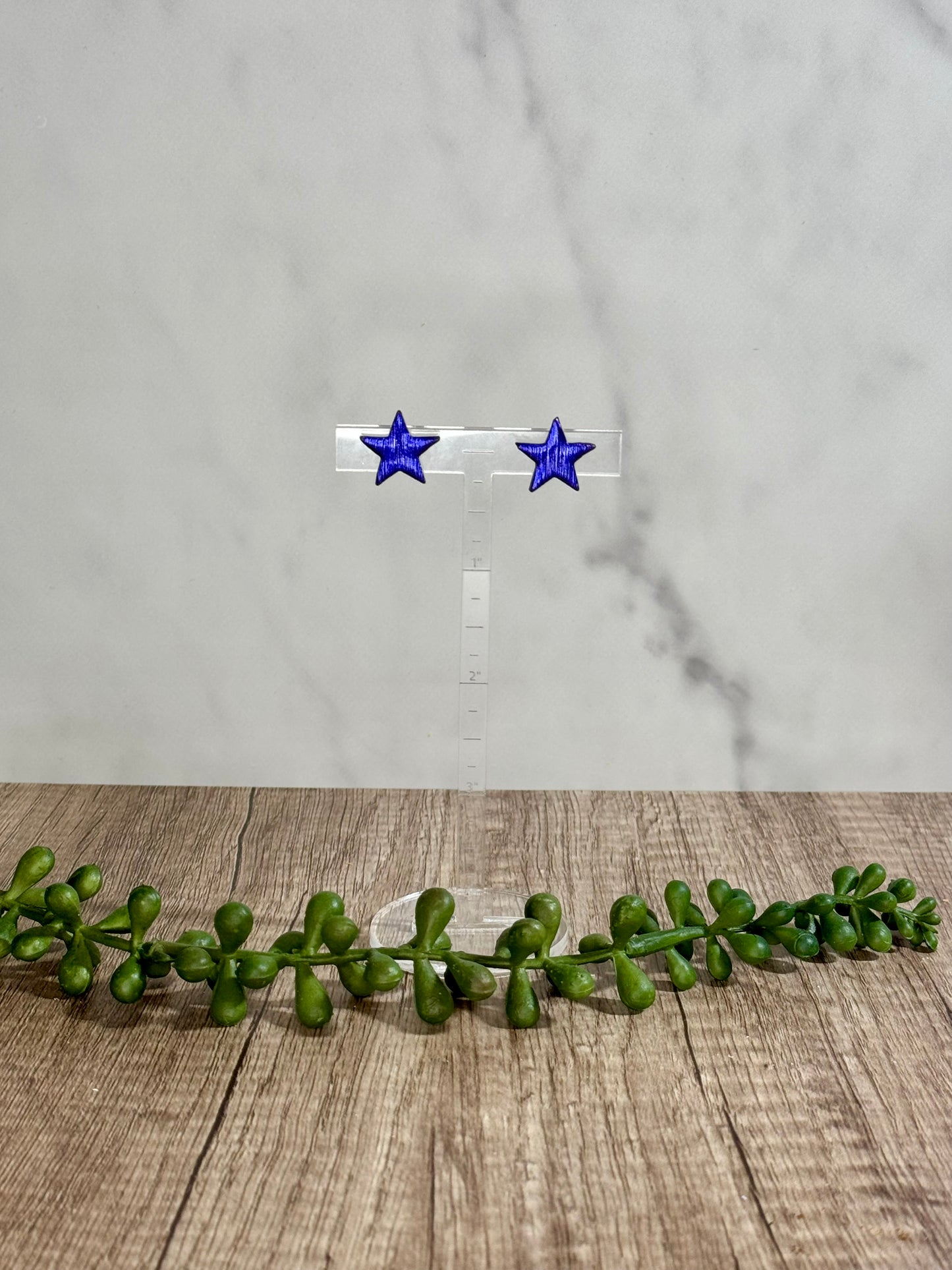 Assorted shimmering star stud earrings